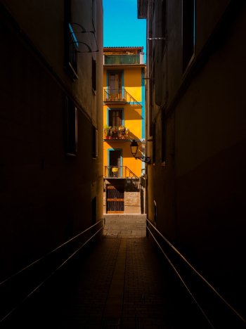 Photo of Alley Between Buildings Photo of Alley Between Buildings