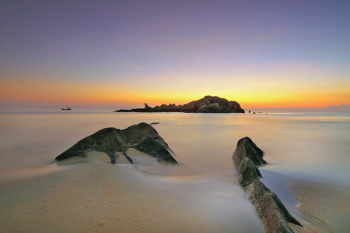 Photo of an Island during Sunset Photo of an Island during Sunset