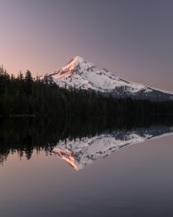 Photo of Body of Water Near Snowy Mountain Photo of Body of Water Near Snowy Mountain