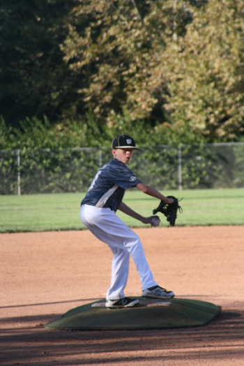 Photo of Boy Pitching Ball Photo of Boy Pitching Ball