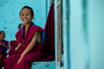 Photo of Boy Wearing Red Robe Photo of Boy Wearing Red Robe