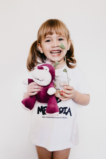 Photo Of Child Holding Stuffed Toy Photo Of Child Holding Stuffed Toy