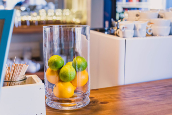 Photo of Citrus Fruits Inside a Clear Glass Photo of Citrus Fruits Inside a Clear Glass