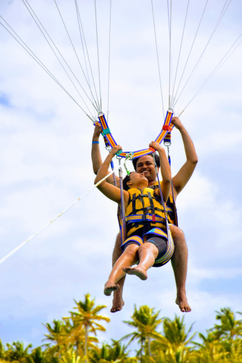 Photo of Couple Parasailing Photo of Couple Parasailing