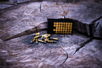 Photo of Gold Ammunitions on Wood Photo of Gold Ammunitions on Wood