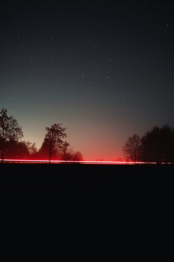 Photo Of Light Rays During Night Photo Of Light Rays During Night