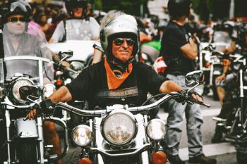Photo of Man Driving Motorbike Photo of Man Driving Motorbike