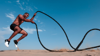 Photo of Man Holding Black Rope Photo of Man Holding Black Rope