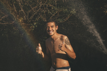 Photo Of Man Holding Out Thumbs Up Photo Of Man Holding Out Thumbs Up
