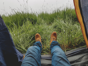 Photo of Man in Blue Jeans and Work Boots Photo of Man in Blue Jeans and Work Boots