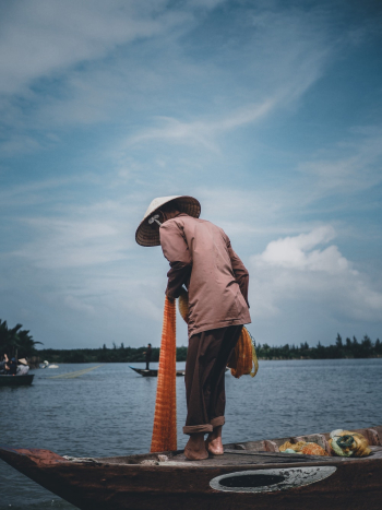 Photo Of Man Standing On Boat Photo Of Man Standing On Boat