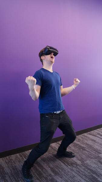 Photo of Man Using Virtual Reality Headset
