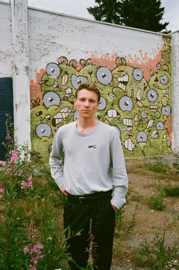 Photo of Man Wearing Grey Sweater Photo of Man Wearing Grey Sweater