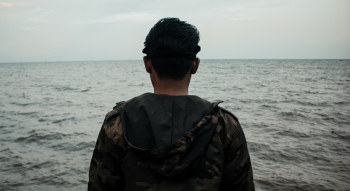 Photo of Man Wearing Hooded Jacket Photo of Man Wearing Hooded Jacket