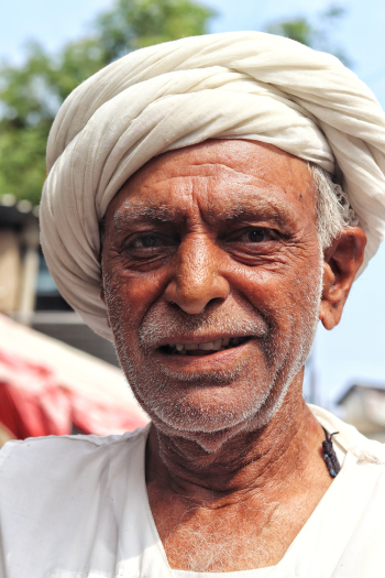 Photo Of Man Wearing White Turban Hat Photo Of Man Wearing White Turban Hat
