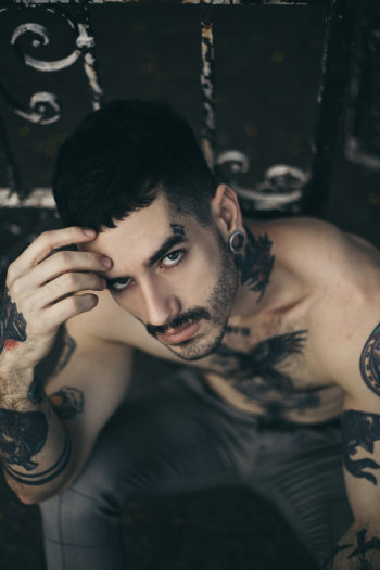 Photo of Man With Tattoos Photo of Man With Tattoos