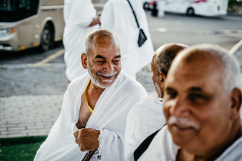 Photo of Men Wearing White Robes Photo of Men Wearing White Robes