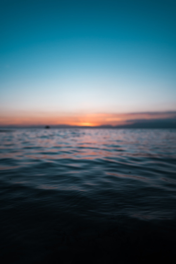 Photo of Ocean During Sunset Photo of Ocean During Sunset