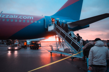 Photo of People Boarding Airliner Photo of People Boarding Airliner