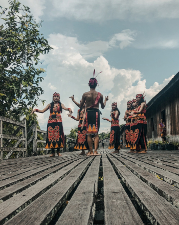 Photo Of People Dancing Wearing Traditional Wear Photo Of People Dancing Wearing Traditional Wear