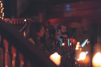 Photo of People Singing Photo of People Singing