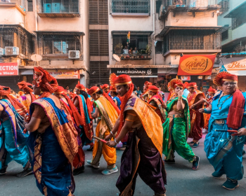 Photo of People Wearing Traditional Clothes Photo of People Wearing Traditional Clothes