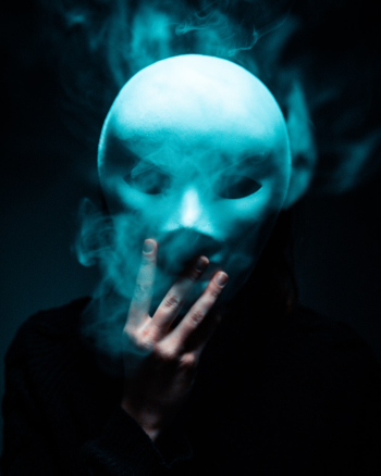 Photo of Person Holding White Mask Photo of Person Holding White Mask