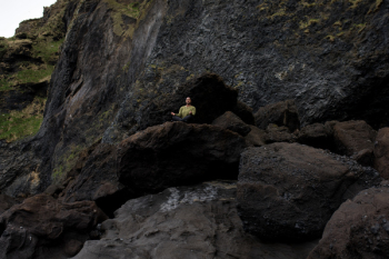 Photo of Person Meditating on Top of Rock Photo of Person Meditating on Top of Rock
