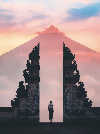 Photo of Person Standing on Temple Photo of Person Standing on Temple