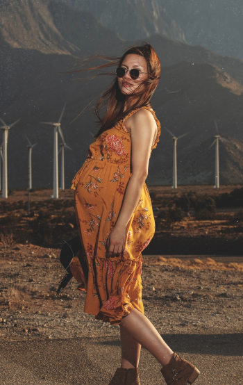 Photo Of Pregnant Woman Wearing Yellow Dress