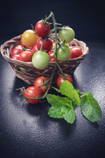 Photo of Tomatoes on Woven Basket Photo of Tomatoes on Woven Basket