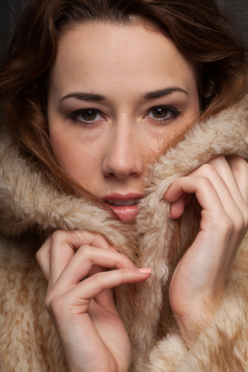 Photo of Woman Covered With Brown Fur Coat Photo of Woman Covered With Brown Fur Coat