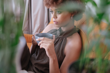 Photo Of Woman Holding Cup Photo Of Woman Holding Cup