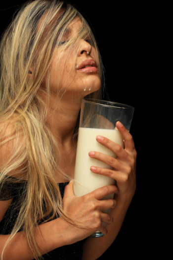 Photo of Woman Holding Glass of Milk Photo of Woman Holding Glass of Milk