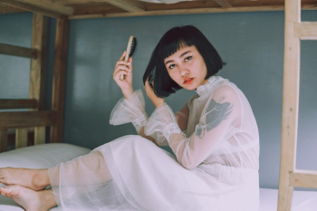 Photo Of Woman Holding Hair Brush Photo Of Woman Holding Hair Brush
