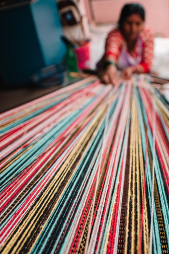 Photo Of Woman Holding Threads