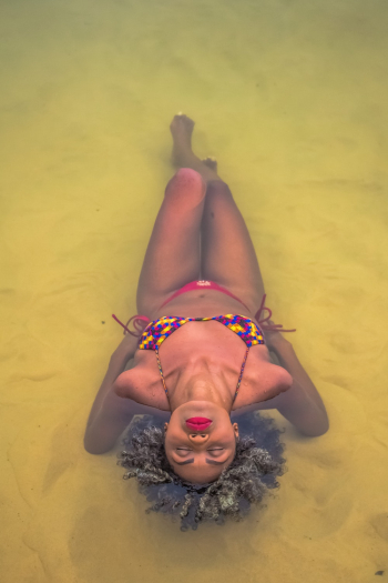 Photo Of Woman Sitting In Water Photo Of Woman Sitting In Water
