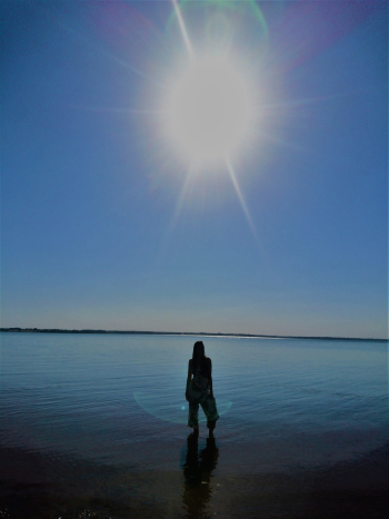Photo Of Woman Standing On Shallow Water Photo Of Woman Standing On Shallow Water