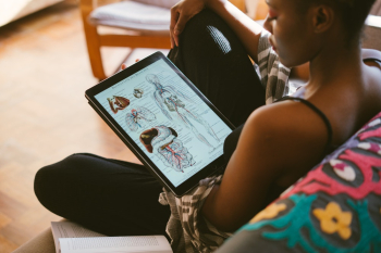 Photo Of Woman Studying Anatomy Photo Of Woman Studying Anatomy