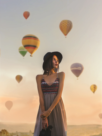 Photo of Woman Wearing Sun Hat Photo of Woman Wearing Sun Hat