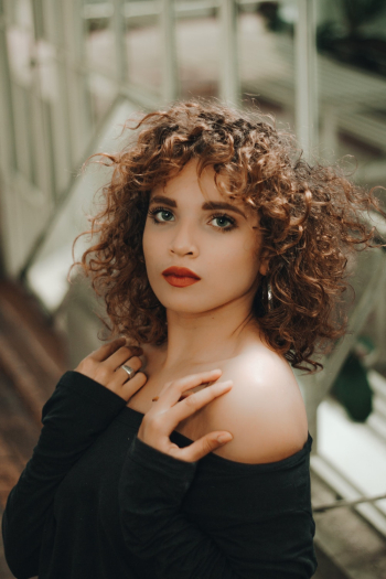 Photo of Woman With Curly Hair Photo of Woman With Curly Hair