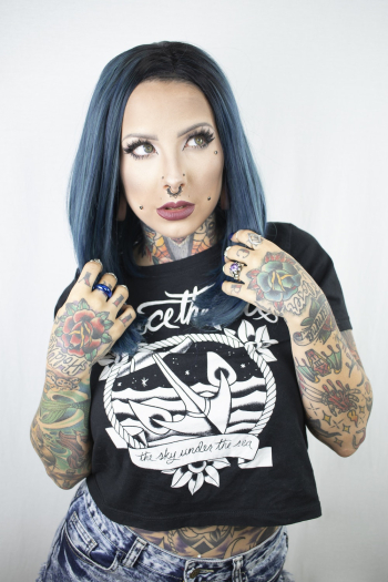 Photo of Woman With Tattoos Photo of Woman With Tattoos