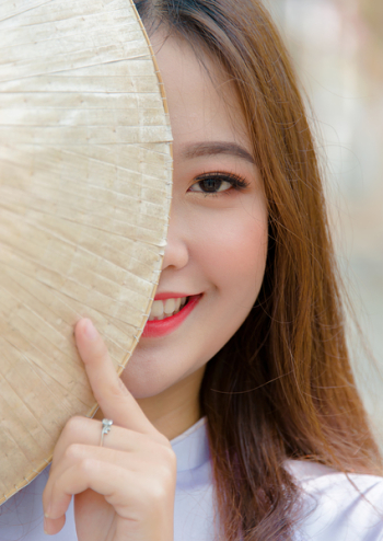 Photo Woman Hiding on Asian Conical Hat Photo Woman Hiding on Asian Conical Hat