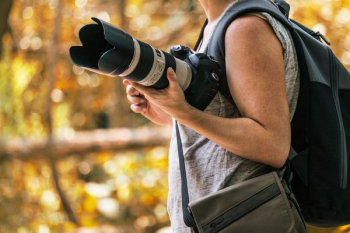Photographer Holding Camera Photographer Holding Camera