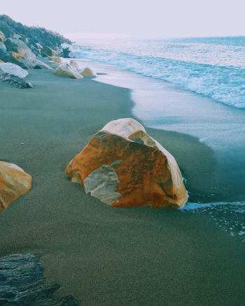 Photography of Brown Rock Near Sea Photography of Brown Rock Near Sea