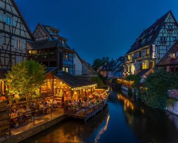 Photography of Buildings and Canal during Nighttime Photography of Buildings and Canal during Nighttime