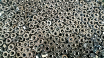 Pile of Silver Hex Nuts Pile of Silver Hex Nuts