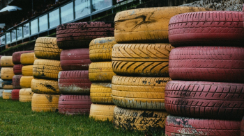 Pile of Yellow And Red Vehicle Tires Pile of Yellow And Red Vehicle Tires