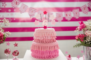 pink birthday cake on tabletop pink birthday cake on tabletop