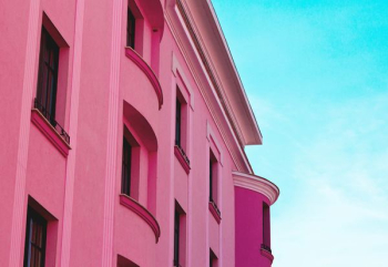 pink concrete building pink concrete building